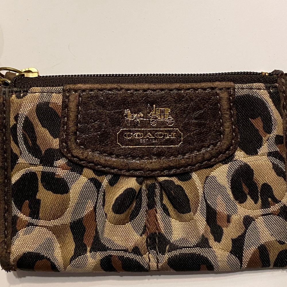 Brown multi-colored coach coin purse